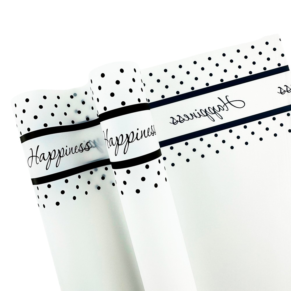 Раиран целофан с черни точки и райета "Dots"