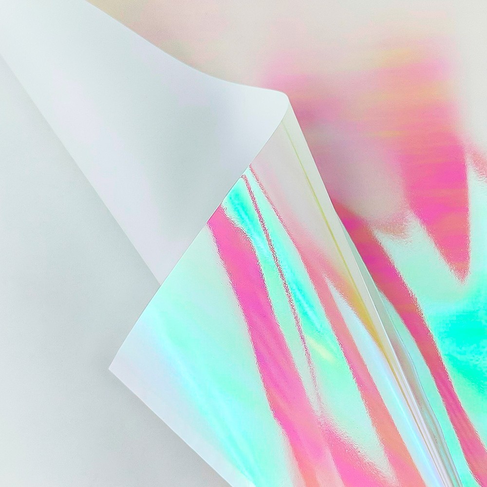 Двустранен бял целофан с холограмен ефект photo 2